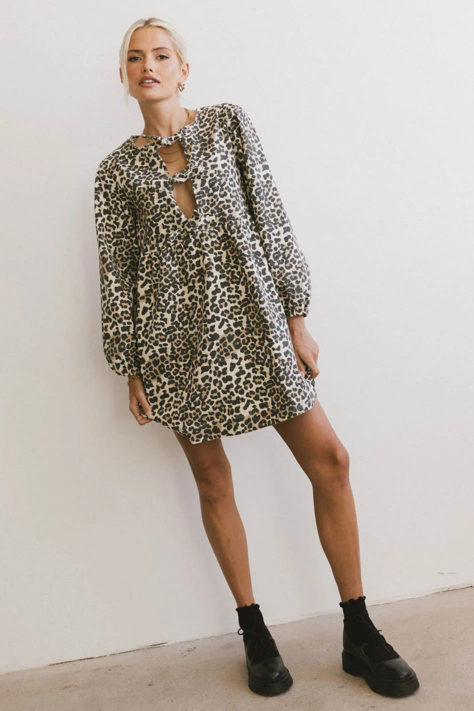 Fashion Essentials Tyler Peplum Mini Dress in Leopard